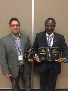 Folefac Aminkeng (right) receives The Canadian Society of Pharmacology and Therapeutics Boehringer Ingelheim Postdoctoral Award in Pharmacology and the Publication Award.
