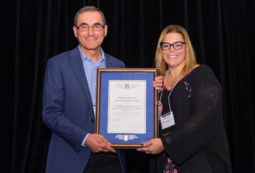 Bob Bluman (left), Executive Medical Director, UBC CPD, accepts the 2017 College of Family Physicians of Canada Continuing Professional Development Program Award for the HOUSE program.