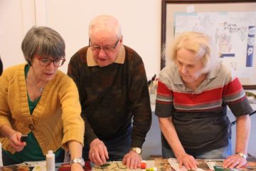 Glo McArter (far right) and her partner, Jack (centre)