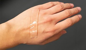 Using sound and bubbles to make bandages stickier and longer lasting