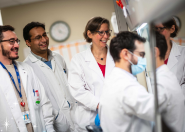 Dr. Megan Levings (third from left) working with three colleagues to develop stem cell therapies at the Levings Lab.