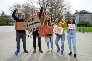 UBC graduate students and postdocs, including the Faculty of Medicine’s Shalini Iyer (right) and Dr. Larissa Kraus (second from right), at the Support Our Science walkout at UBC’s Vancouver campus. (Photo credit: Shalini Iyer)