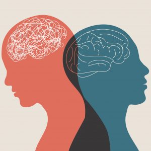 An illustrative metaphor of bipolar disorder depicting two silhouettes of a person’s head. The silhouette on the left has a tangled brain and the silhouette on the right has an untangled brain.