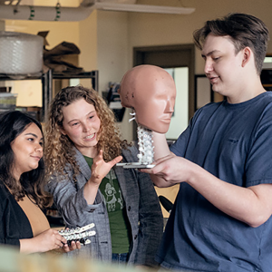 Dean Harris (right), a former participant of seed2STEM, with two colleagues from ICORD’s Orthopaedic and Injury Biomechanics Group. Credit: Martin Dee/ICORD.